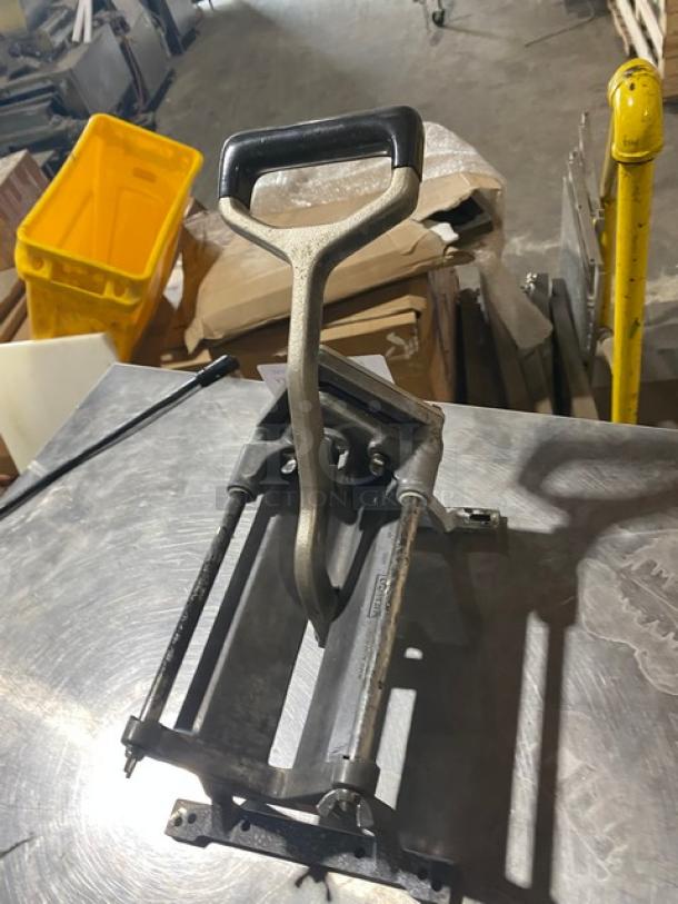 Nemco commercial heavy-duty manual countertop french fry cutter, metal construction, ergonomic handle, used condition.