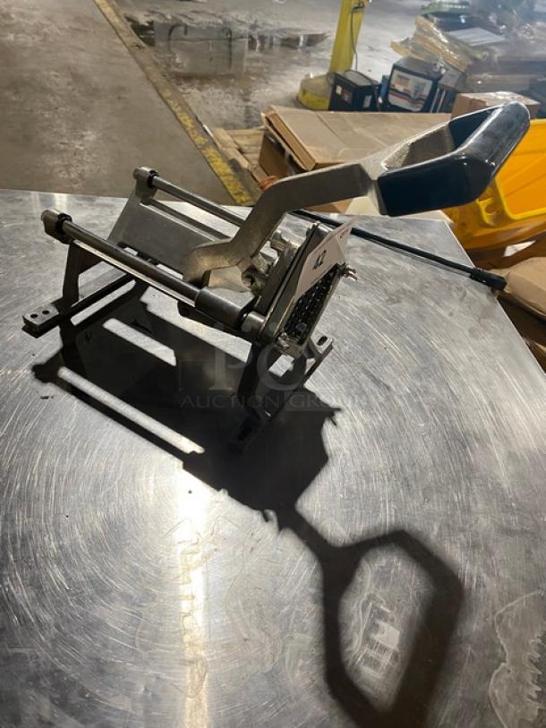 Nemco manual countertop french fry cutter, heavy-duty, stainless steel, good condition, sturdy base, ergonomic handle.