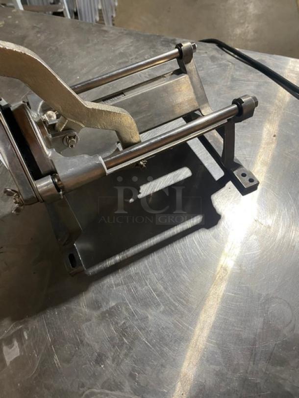 Nemco commercial heavy-duty manual countertop French fry cutter in good condition, featuring stainless steel construction.