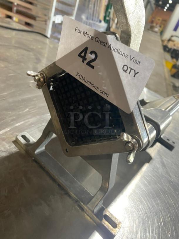Nemco commercial heavy-duty manual countertop french fry cutter, metal construction, item tag with auction info visible.