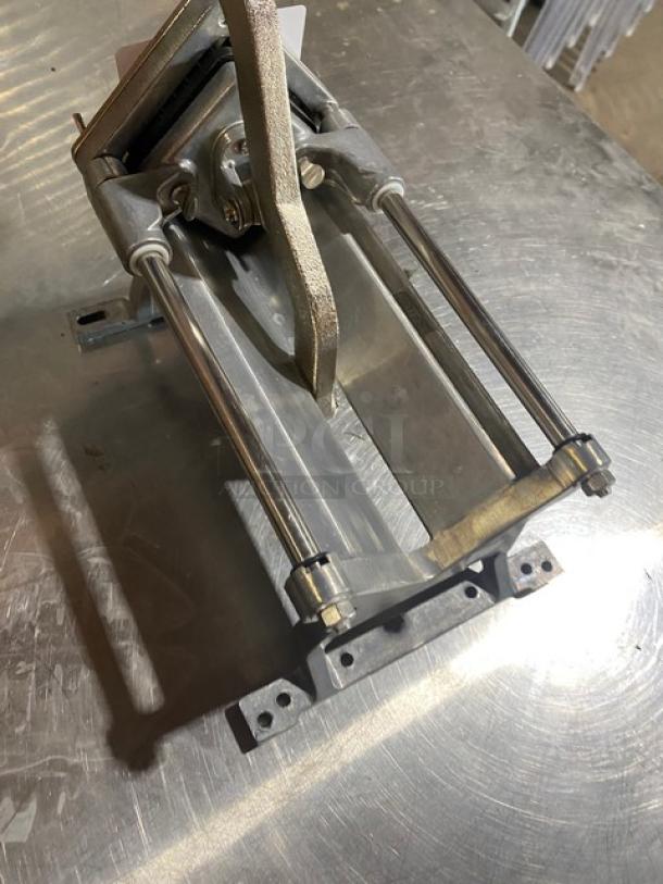 Nemco commercial heavy-duty manual countertop french fry cutter, sturdy metal construction, excellent condition.