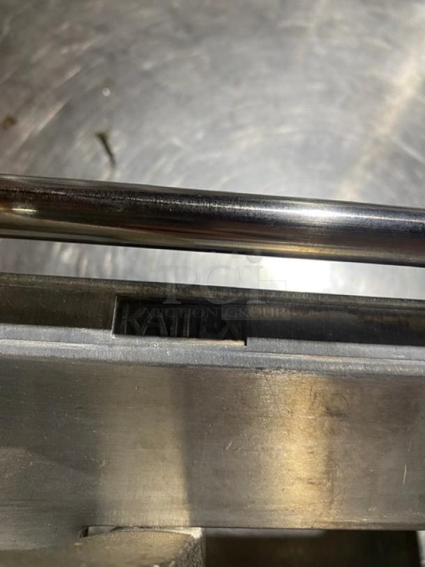 Nemco commercial heavy-duty manual countertop French fry/potato cutter, sturdy metal construction, brand marked on handle.