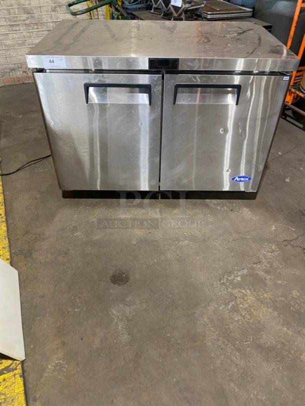 Atosa MGF8406GR commercial stainless steel 2-door undercounter worktop freezer on casters, with poly-coated wired rack.