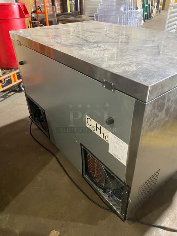 Atosa MGF8406GR commercial stainless steel 2-door undercounter worktop freezer, poly coated rack, on casters.