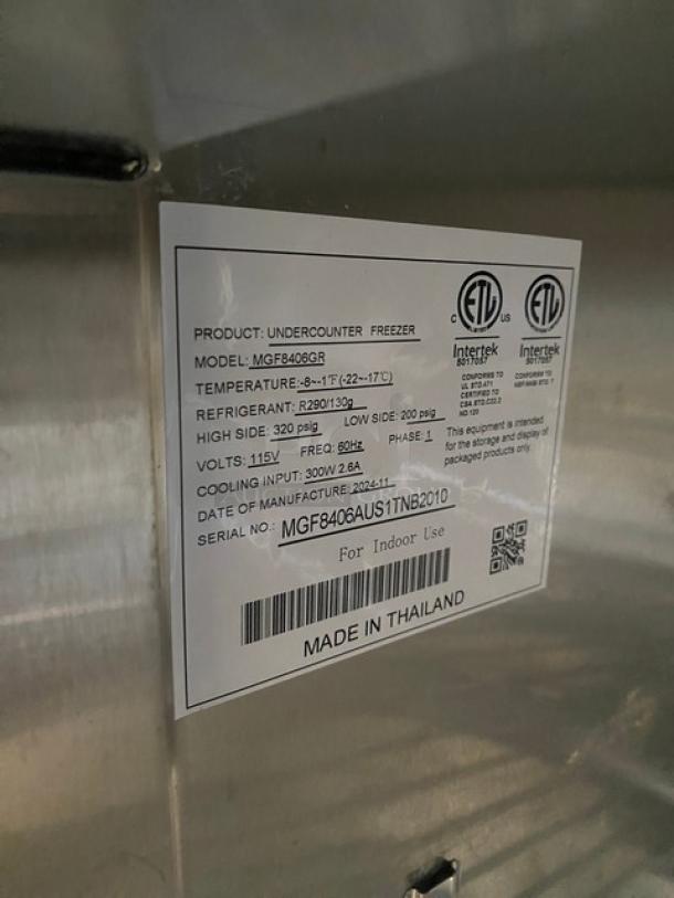 Atosa MGF8406GR commercial undercounter worktop freezer label detailing specs and serial number.