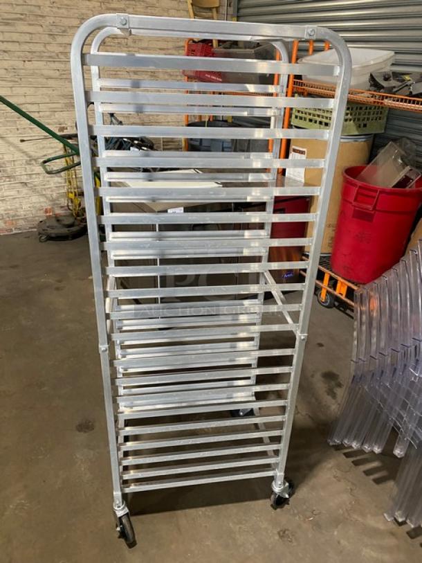 Winco ALRK-20 aluminum 20-pan sheet pan rack on casters, ideal for commercial use, in good condition.