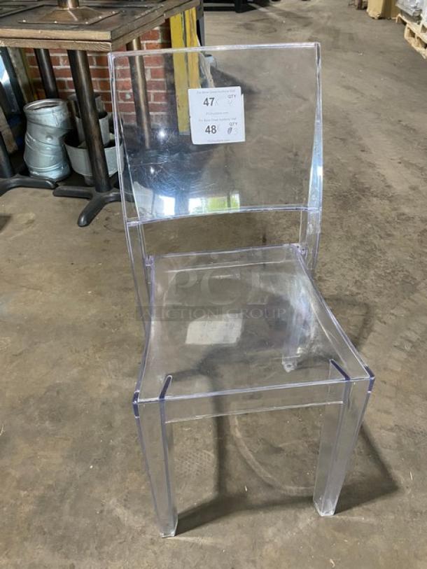 Clear stackable dining chair, commercial-grade, versatile for indoor/outdoor use. Features durable clear plastic, elegant design.