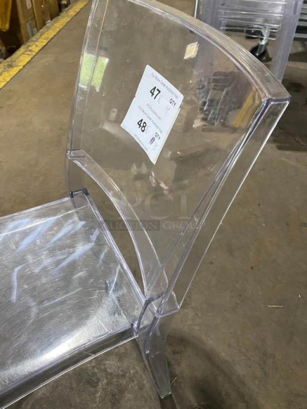 Clear stackable dining chair for indoor/outdoor use, on legs. Commercial-grade design, visible label with quantity details.