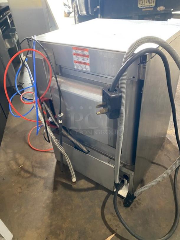 Hobart Advansys LXER undercounter dishwasher, stainless steel, electric, high temperature, includes full-size peg rack, on legs.