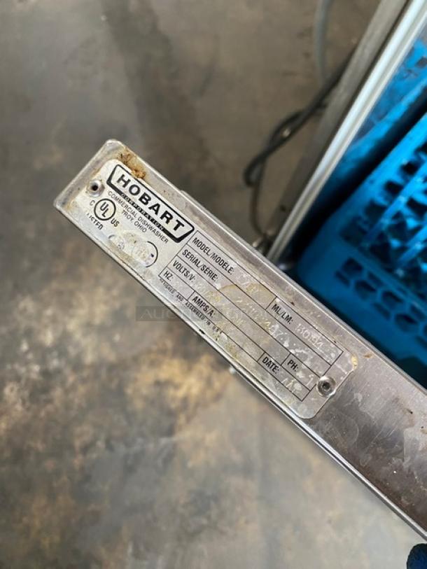 Hobart Advansys LXe Series commercial dishwasher, stainless steel, model LXER, with tag indicating serial number 231183497.