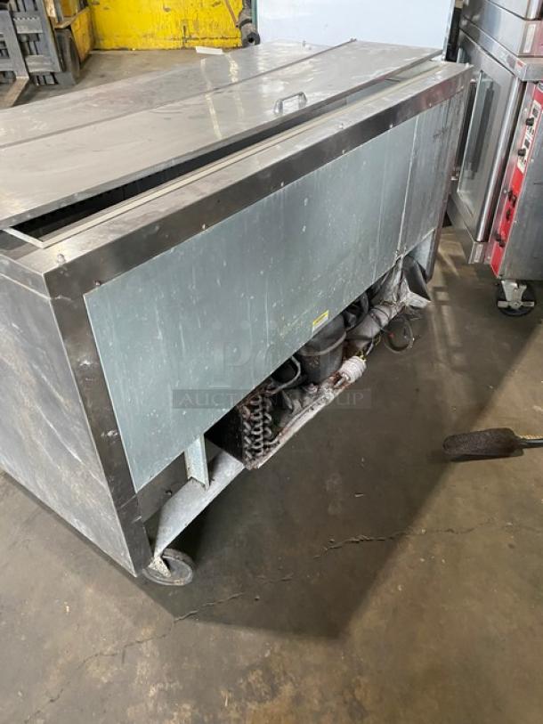 Beverage-Air SP60-16 stainless steel 2-door refrigerated prep table on casters, shown in used condition.