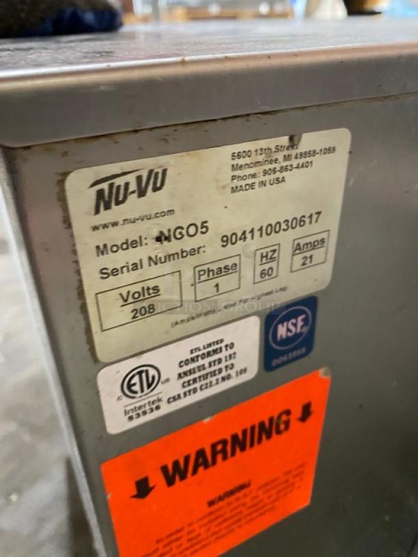 Nu-Vu NCO5 stainless steel convection oven, model NCO5, serial 904110030617, 208V, 1 phase, on legs, with thermostatic control.