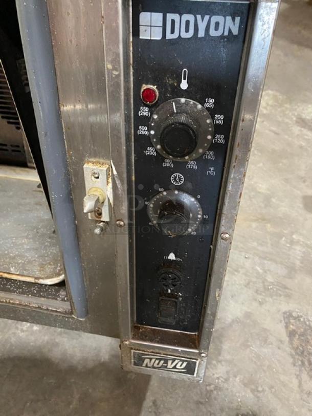 Nu-Vu Doyon Series NCO5 countertop convection oven, stainless steel, thermostatic control, 208V 1 Phase, on legs.