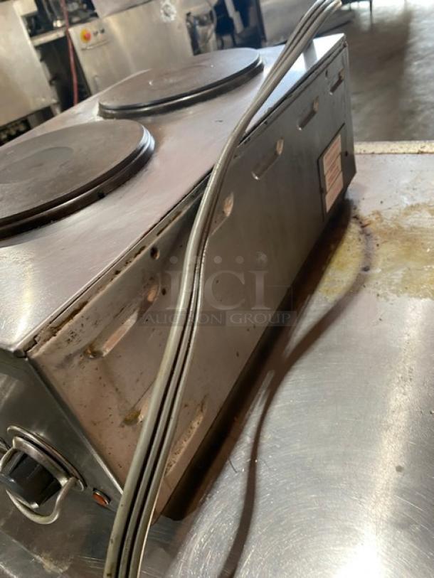 Wells Commercial Stainless Steel 2-Burner Hotplate, Model H70, Electric 208-240V, with individual controls, visible wear.