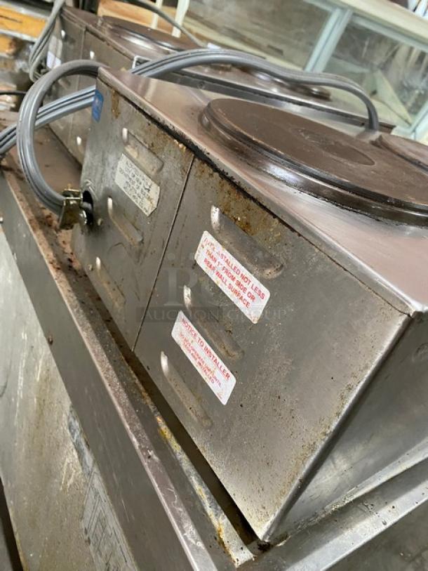 Wells H70 stainless steel electric 2-burner hotplate with individual controls. Model: H70, SN: H7700717A0006, 208-240V. Used condition with visible labels.