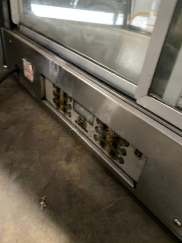 Vendo stainless steel electric countertop heated food display case with double glass sliding doors, visible controls, 115V 1 Phase.