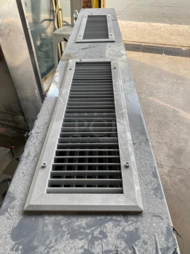 Pro Kitchen Supply stainless steel exhaust hood, model UHGV, commercial-grade, lightly used, durable construction with slatted vent openings.