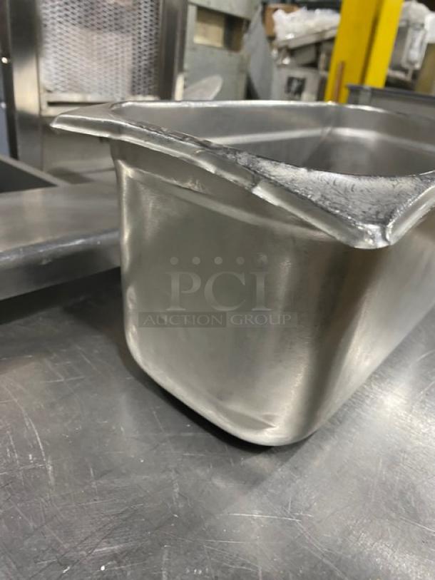 Commercial stainless steel steamtable pan, durable design, used condition, ideal for hotels or catering services.