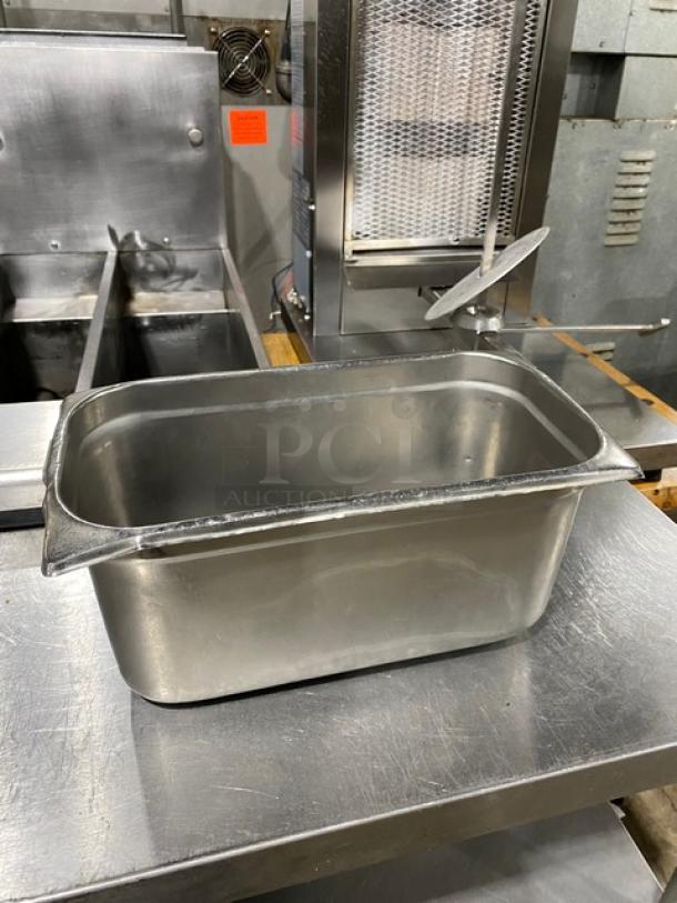 Commercial stainless steel hotel pan, rectangular, durable, in excellent condition, ideal for steam tables or catering.