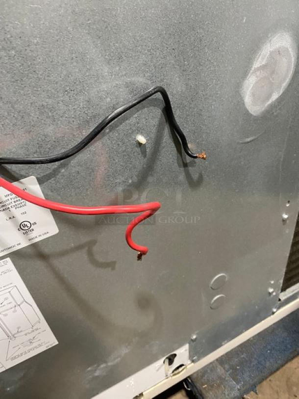 Manitowoc SY1804A ice machine head, stainless steel, electric, air-cooled, 208-230V, 1 phase, visible wiring and labels.