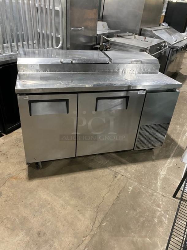 True TPP-60 refrigerated pizza prep table, stainless steel, 2-door, poly coated rack, 115V, on casters, commercial use.
