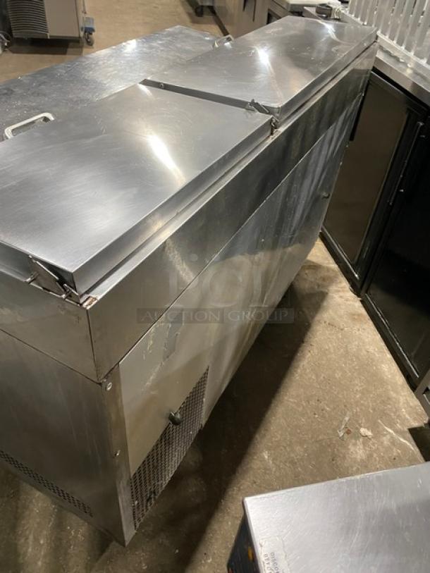 True TPP-60 stainless steel refrigerated pizza prep table with two doors, poly coated wired rack, on casters, 115V.