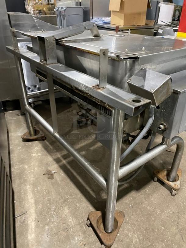 Groen HFP2E4 stainless steel tilt skillet, gas-powered, model HFP/2E-4, on sturdy legs, used condition.