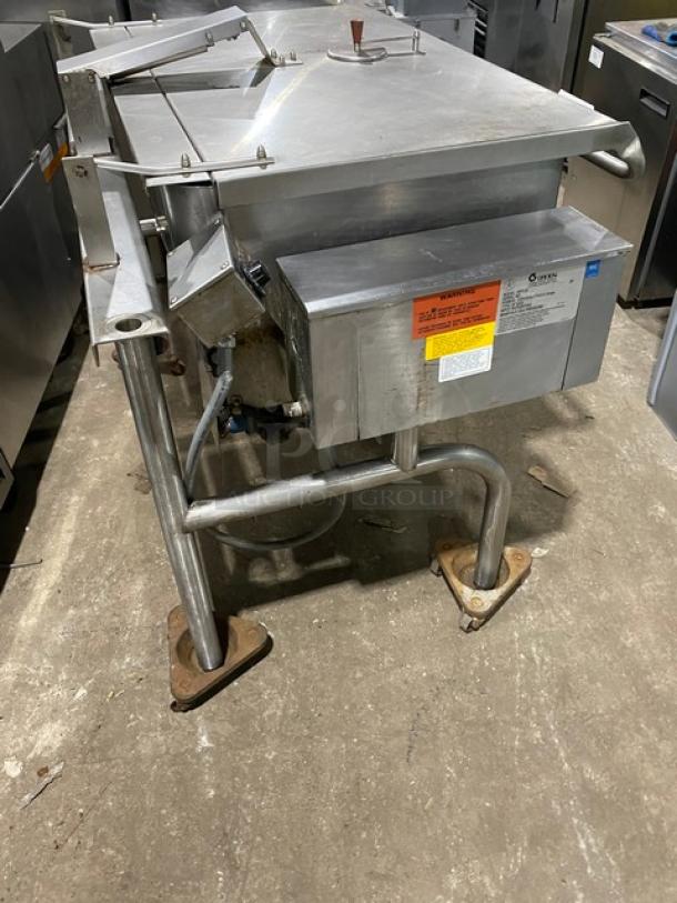 Groen stainless steel gas-powered tilt skillet, model HFP2E4, with control panel and sturdy legs. Serial: 24542HCF.