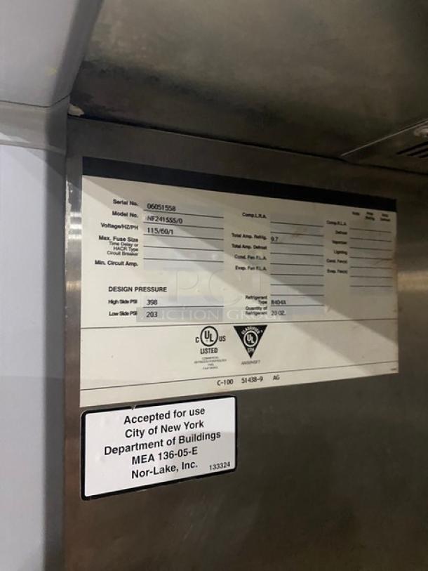 Norlake NF241SSS0 commercial freezer with poly coated rack, stainless steel, single door, 115V, on casters. Serial: 06051558.