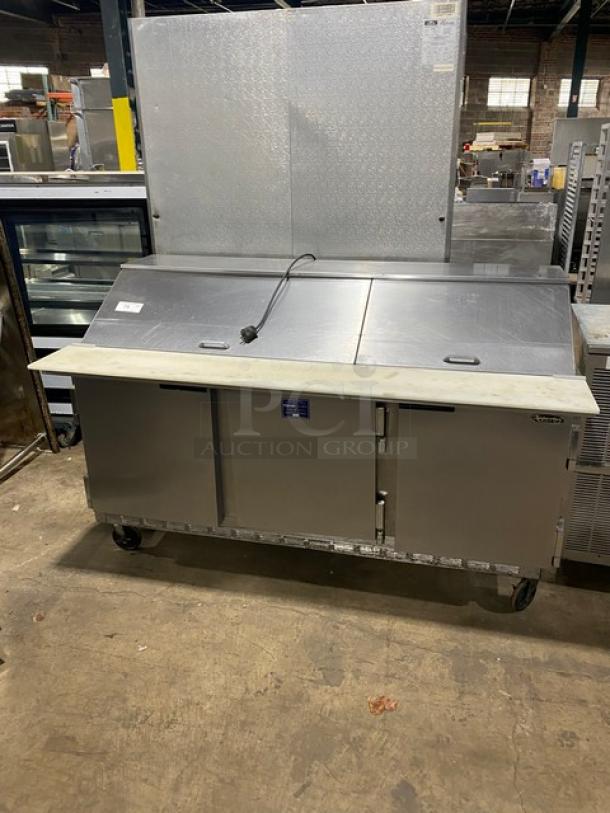 Beverage-Air SP72-30M 3-door stainless steel refrigerated sandwich prep table, Bain Marie style, with cutting board and wired rack.