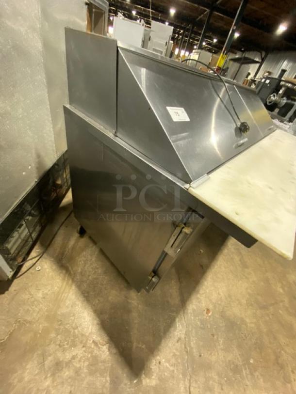 Beverage-Air 3-door stainless steel bain marie salad/sandwich prep table, model SP72-30M, with cutting board, on casters.