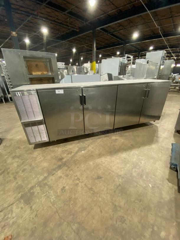 Perlick commercial stainless steel 4-door refrigerated back bar cabinet with poly-coated wired rack. Serial Number: 518921.