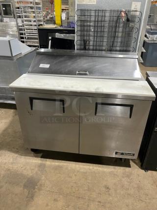 True Commercial Stainless Steel 2 Door Refrigerated Bain Marie Style Salad/Sandwich Prep Table! With Cutting Board! With Poly Coated Wired Rack! Model: TSSU-48-12 SN: 7474350! 115V 1 Phase! On Casters! - Item #1207521