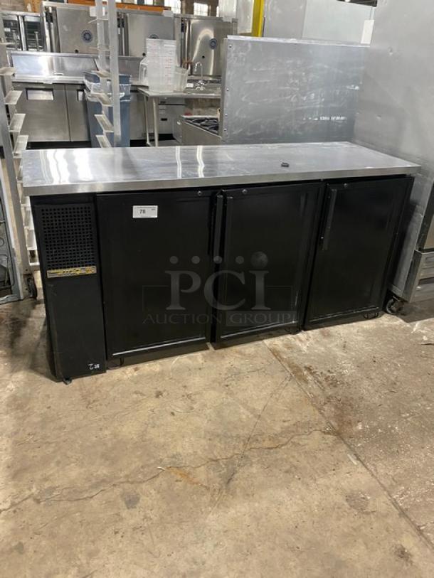 True commercial black triple glass door back bar cabinet, model TBB-24-72G, with stainless steel worktop and wired rack. 