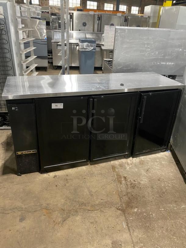 True commercial black triple glass swing door back bar cabinet with stainless steel worktop and wired rack, Model TBB-24-72G.