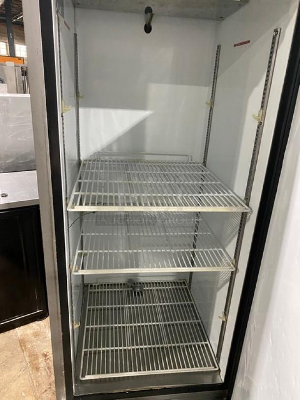 Beverage-Air KR24-1AS commercial stainless steel single door refrigerator with poly coated wire racks, on casters, clean condition.