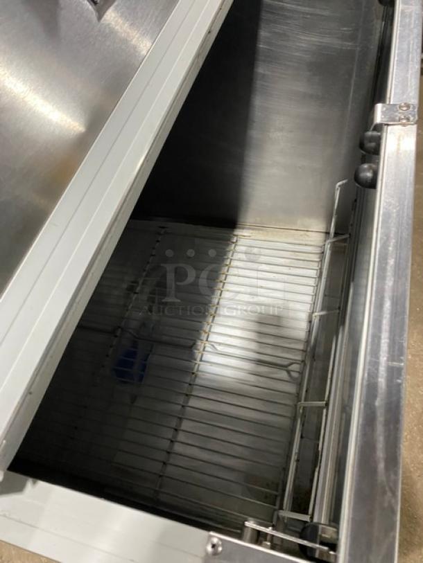 Beverage-Air SMF34 stainless steel milk cooler, single-access, electric, 115V, on casters, model tag visible.