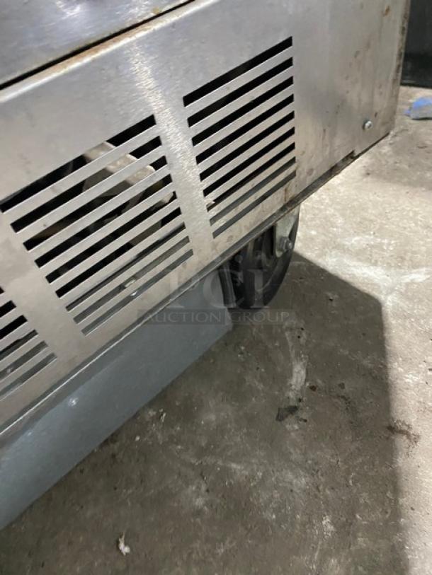 Beverage-Air stainless steel single-access milk cooler, model SMF34, electric, 115V, on casters, in used condition.