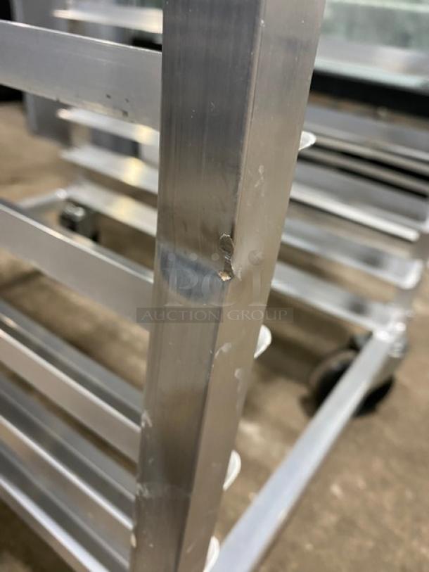 Channel Model 401AC aluminum pan rack, holds 20 pans, end load, on casters, minor wear visible.