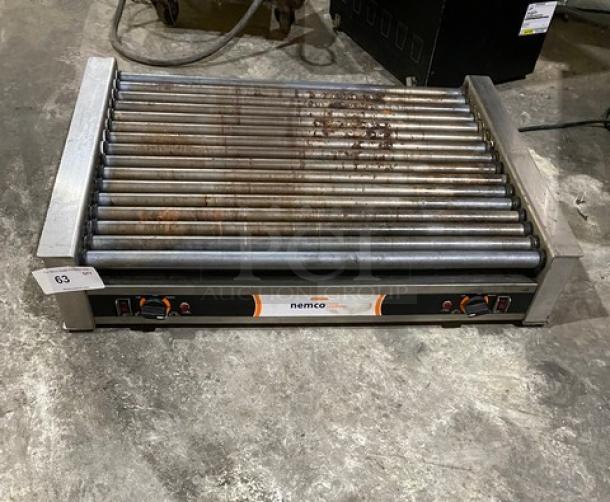 Nemco commercial stainless steel electric countertop hot dog roller grill, used condition, visible controls and logo.