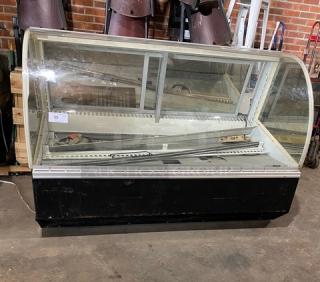 Federal Industries Commercial Curved Glass Refrigerated Meat Deli Merchandiser Display Case! With Rear Double Glass Sliding Door! Model: SN6CD-2 SN: 04050328747-1! 120V 1 Phase! - Item #1207490