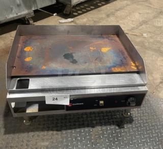 Cecilware EL1624 commercial stainless steel electric griddle with thermostatic control, back and side splash, on legs.