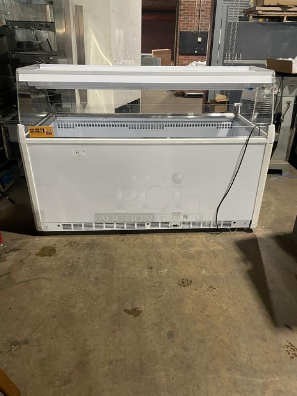 Vendo commercial white dipping cabinet, Model NIC183S02, with sneeze guard and LED lighting. 220V, 1 phase.