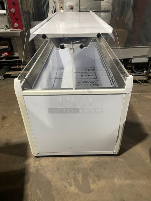 Vendo commercial white open-air ice cream dipping cabinet NIC183S02, with single shelf sneeze guard, LED lighting, 220V, 1 phase.