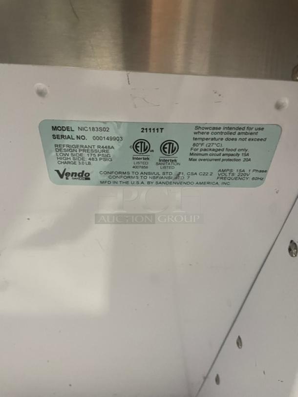 Vendo NIC183S02 ice cream/frozen yogurt merchandiser, SN: 000149903. Features stainless steel finish, sneeze guard, LED lighting. 220V, 1-phase.