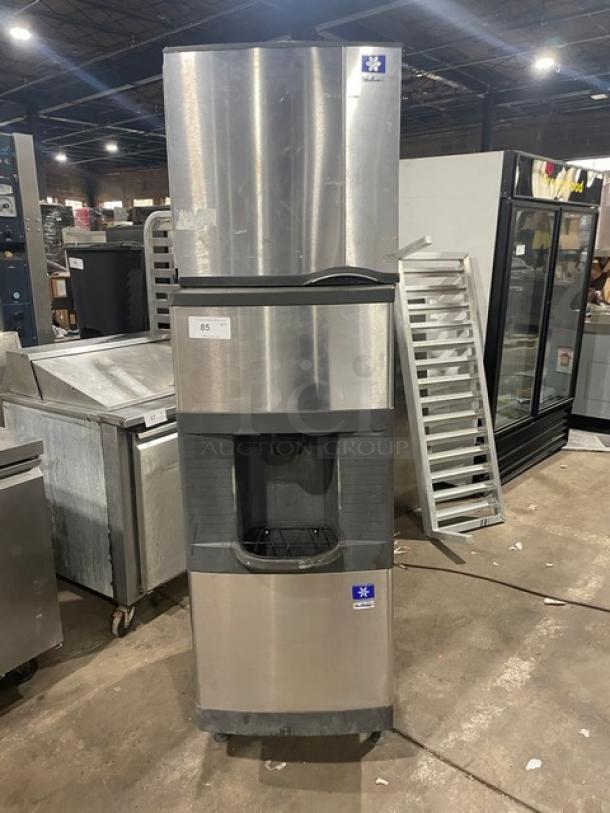 Manitowoc ice machine model SD0423W/QPA160, stainless steel, electric, water-cooled, on legs, commercial use.