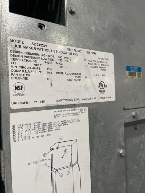 Manitowoc SD0423W/QPA160 stainless steel ice maker, electric, water-cooled, 115/120V, 1 phase, NSF, UL listed, on legs.
