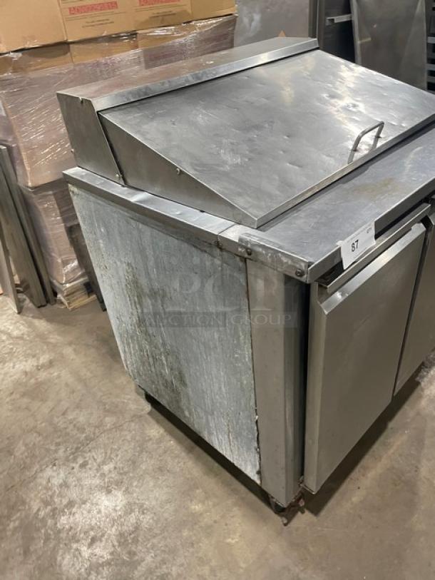 Cool-Tech Custom36BMB 2-Door Refrigerated Prep Table, stainless steel, bain marie style, on casters, visible wear.
