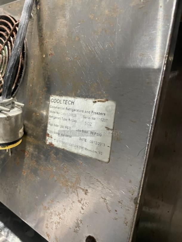 Cool-Tech Commercial Stainless Steel 2 Door Refrigerated Prep Table, Model Custom36BMB, SN: 116207, on casters, label visible.