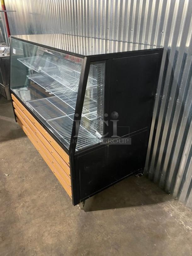 Commercial black 72" slanted glass refrigerated deli merchandiser with dual glass sliding doors, poly-coated wire racks, and casters.